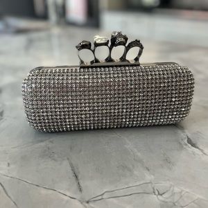 Brass knuckle stone clutch purse
